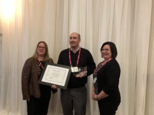 Jason Van Rooy, Marketing Manager receives the Innovation Award for the Towers Realty Group Resident Benefits Program